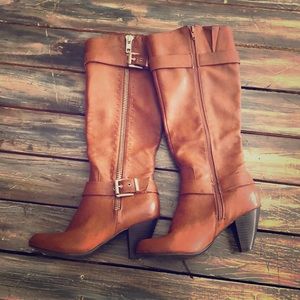 Brown faux leather boots with gold trim in size 7